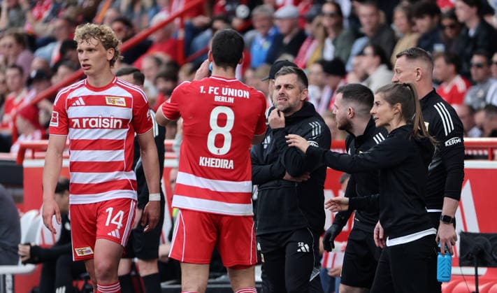 re coach Marie Louise Eta talks to Rani Khedira, Leopold Querfeld, Aljoscha Kemlein Sport Football Soccer Bundesliga Men DFL 30 Matchday Season 2025 2026 18 04 2026 1 FC Union Berlin FCU vs VfL Wolfsburg WOB DFL regulations prohibit any use of photographs as image sequences and or quasi video