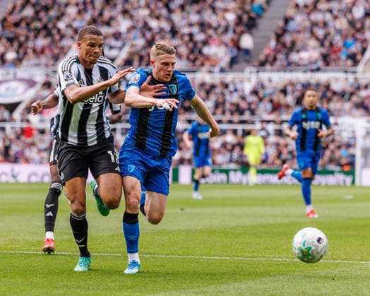 18th April 2026; St James Park, Newcastle, England; Premier League Football, Newcastle United versus Bournemouth; Malick Thiaw of Newcastle United held off by Adrien Truffert of Bournemouth WMxSportsxMedia