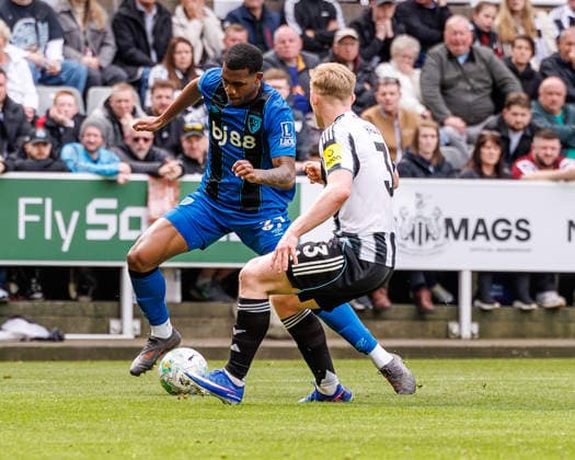 18th April 2026; St James Park, Newcastle, England; Premier League Football, Newcastle United versus Bournemouth; Rayan of Bournemouth takes on Lewis Hall of Newcastle United WMxSportsxMedia