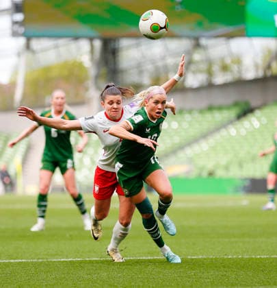 18th April 2026; Aviva Stadium, Dublin, Ireland; 2026 Womens World Cup Qualifier Football, Republic of Ireland versus Poland; Denise O Sullivan of Ireland heads the ball under pressure from Martyna Wiankowska of Poland PeterxFitzpatrick