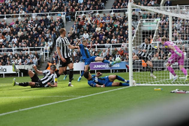 Newcastle Upon Tyne, England, 18th April 2026. Adrien Truffert of AFC Bournemouth scores his teams second goal during the Newcastle United vs AFC Bournemouth Premier League match at St. James Park, Newcastle Upon Tyne. Picture credit should read: Nigel Roddis Sportimage EDITORIAL USE ONLY. No use with unauthorised audio, video, data, fixture lists, club league logos or live services. Online in-match use limited to 120 images, no video emulation. No use in betting, games or single club league player publications. SPI_039_NR_NEWC_BOUR SPI-4699-0038