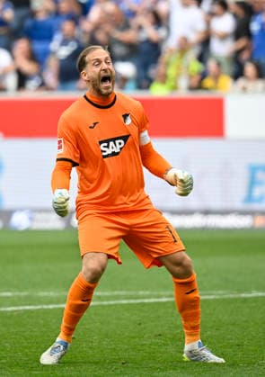Sport Bilder des Tages nach Spielende: Schlussjubel, Freude, Glueck, Jubel Torwart Oliver Baumann TSG 1899 Hoffenheim (01) TSG 1899 Hoffenheim vs Borussia Dortmund BVB 18.04.2026 DFL REGULATIONS PROHIBIT ANY USE OF PHOTOGRAPHS AS IMAGE SEQUENCES AND OR QUASI-VIDEO TSG 1899 Hoffenheim vs Borussia Dortmund *** after the end of the match final cheers, joy, happiness, jubilation goalkeeper Oliver Baumann TSG 1899 Hoffenheim 01 TSG 1899 Hoffenheim vs Borussia Dortmund BVB 18 04 2026 DFL REGULATIONS PROHIBIT ANY USE OF PHOTOGRAPHS AS IMAGE SEQUENCES AND OR QUASI VIDEO TSG 1899 Hoffenheim vs Borussia Dortmund