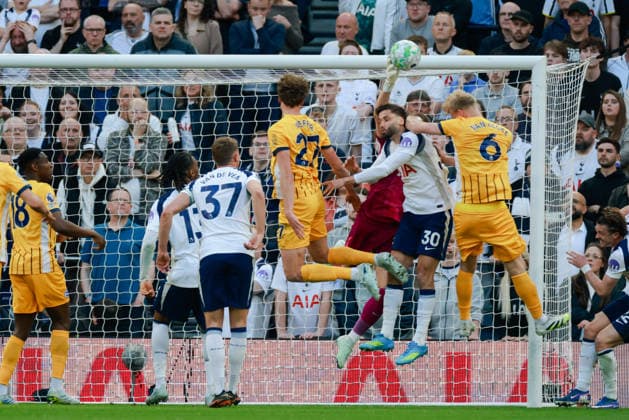 Premier League 2025 26 Tottenham Hotspur v Brighton and Hove Albion Tottenham Hotspur Stadium 18.04.2026 Antonin Kinsky of Tottenham Hotspur punches clear as Rodrigo Bentancur of Tottenham Hotspur and Jan Paul van Hecke of Brighton and Hove Albion clash Premier League 2025 26 Tottenham Hotspur v Brighton and Hove Albion Tottenham Hotspur Stadium 18.04.2026 Photograph By Marc Aspland The Times  Copyright: xMarcxAsplandx NINTCHDBPICT001074482481