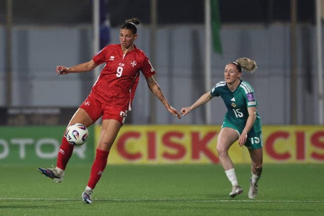 Kailey Willis (left) of Malta is followed by Rebecca Holloway of Northern Ireland during the FIFA Women™s World Cup 2027 European qualifiers League B, Group B2 soccer match between Malta and Nothern Ireland at the Centenary Stadium, Ta™ Qali, Malta on 18 April 2026. Women™s European Qualifiers - Malta v Northern Ireland