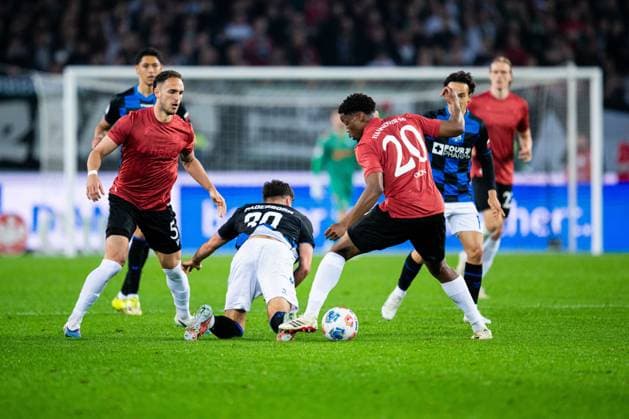 18 04 2026 Soccer, 2025 2026, 2 Bundesliga, Matchday 30, Hannover 96 SC Paderborn 07 L R Virgil GhiÈa Hannover , Stefano Marino Paderborn , Ime Okon Hannover DFL REGULATIONS PROHIBIT ANY USE OF PHOTOGRAPHS AS IMAGE SEQUENCES AND OR QUASI VIDEO