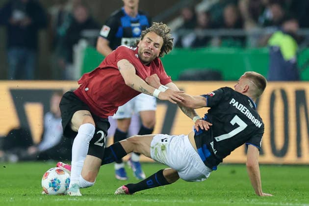 Kolja Oudenne Hannover 96 and Filip Bilbija SC Paderborn 07 battle for the ball, 2 Bundesliga, Hannover 96 v SC Paderborn 07, Heinz von Heiden Arena on April 18, 2026 in Hanover, Germany Photo by Marco Steinbrenner DeFodi Images Kolja Oudenne Hannover 96 and Filip Bilbija SC Paderborn 07 battle for the ball, 2 Bundesliga, Hannover 96 v SC Paderborn 07, Heinz von Heiden Arena, April 18, 2026 in Hanover, Germany Photo by Marco Steinbrenner DeFodi Images