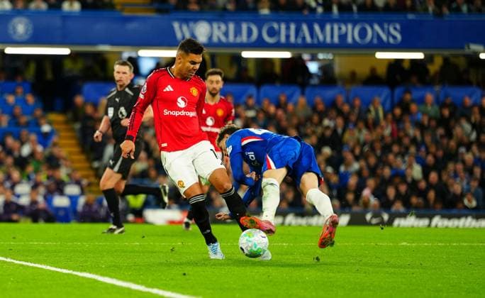 Casemiro of Manchester United, ManU easily dispossesses Alejandro Garnacho of Chelsea leading to boos from home fans Chelsea v Manchester United, Premier League, Football, Stamford Bridge, London, UK - 18 Apr 2026London Stamford Bridge United Kingdom EDITORIAL USE ONLY No use with unauthorised audio, video, data, fixture lists, club league logos or live services. Online in-match use limited to 120 images, no video emulation. No use in betting, games or single club league player publications. Copyright: xJavierxGarcia Shutterstockx 16832178aw