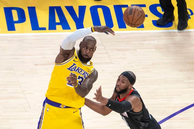 April 18, 2026, Los Angeles, California, USA: Los Angeles LakersÃ¢â‚¬â ¢ LeBron James (23) passes the ball while defended by Houston RocketsÃ¢â‚¬â ¢ Josh Okogie (20) during Game 1 of a first-round NBA, Basketball Herren, USA playoff series at Crypto.com Arena on Saturday, April 18, 2026 in Los Angeles. Los Angeles USA - ZUMAc68_ 20260418_zaf_c68_004 Copyright: xRingoxChiux