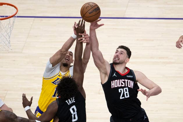 April 18, 2026, Los Angeles, California, USA: Los Angeles LakersÃ¢â‚¬â ¢ Jaxson Hayes (11) vies for the ball against Houston RocketsÃ¢â‚¬â ¢ Alperen Sengun (28) and JaeÃ¢â‚¬â ¢Sean Tate (8) during Game 1 of a first-round NBA, Basketball Herren, USA playoff series at Crypto.com Arena on Saturday, April 18, 2026 in Los Angeles. Los Angeles USA - ZUMAc68_ 20260418_zaf_c68_008 Copyright: xRingoxChiux