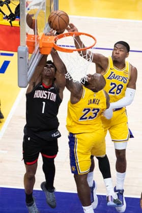 April 18, 2026, Los Angeles, California, USA: Houston RocketsÃ¢â‚¬â ¢ Amen Thompson (1) goes to the basket under pressure from Los Angeles LakersÃ¢â‚¬â ¢ LeBron James (23) and Rui Hachimura (28) during Game 1 of a first-round NBA, Basketball Herren, USA playoff series at Crypto.com Arena on Saturday, April 18, 2026 in Los Angeles. Los Angeles USA - ZUMAc68_ 20260418_zaf_c68_018 Copyright: xRingoxChiux