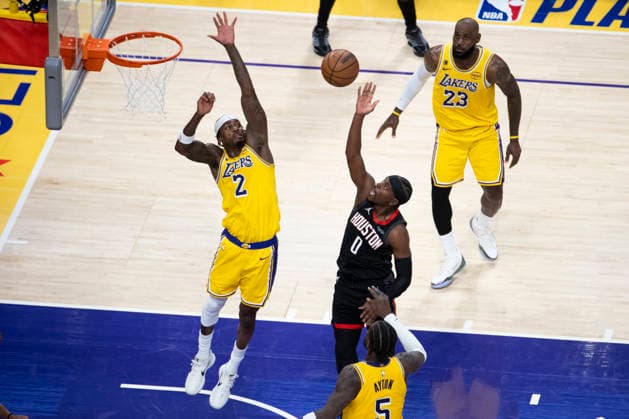 April 18, 2026, Los Angeles, California, USA: Houston RocketsÃ¢â‚¬â ¢ Aaron Holiday (0) shoots against Los Angeles LakersÃ¢â‚¬â ¢ Jarred Vanderbilt (2) during Game 1 of a first-round NBA, Basketball Herren, USA playoff series at Crypto.com Arena on Saturday, April 18, 2026 in Los Angeles. Los Angeles USA - ZUMAc68_ 20260418_zaf_c68_023 Copyright: xRingoxChiux