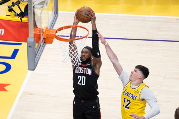 April 18, 2026, Los Angeles, California, USA: Houston RocketsÃ¢â‚¬â ¢ Josh Okogie (20) dunks against Los Angeles LakersÃ¢â‚¬â ¢ Jake LaRavia (12) during Game 1 of a first-round NBA, Basketball Herren, USA playoff series at Crypto.com Arena on Saturday, April 18, 2026 in Los Angeles. Los Angeles USA - ZUMAc68_ 20260418_zaf_c68_027 Copyright: xRingoxChiux