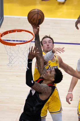 April 18, 2026, Los Angeles, California, USA: Houston RocketsÃ¢â‚¬â ¢ Jabari Smith Jr. (10) goes to the basket under pressure from Los Angeles LakersÃ¢â‚¬â ¢ Luke Kennard (10) during Game 1 of a first-round NBA, Basketball Herren, USA playoff series at Crypto.com Arena on Saturday, April 18, 2026 in Los Angeles. Los Angeles USA - ZUMAc68_ 20260418_zaf_c68_029 Copyright: xRingoxChiux
