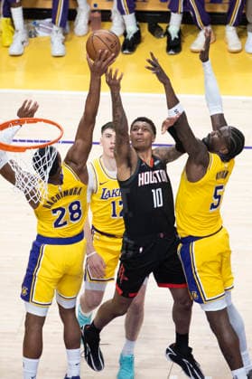 April 18, 2026, Los Angeles, California, USA: Houston RocketsÃ¢â‚¬â ¢ Jabari Smith Jr. (10) goes to the basket under pressure from Los Angeles LakersÃ¢â‚¬â ¢ Deandre Ayton (5) and Rui Hachimura (28) during Game 1 of a first-round NBA, Basketball Herren, USA playoff series at Crypto.com Arena on Saturday, April 18, 2026 in Los Angeles. Los Angeles USA - ZUMAc68_ 20260418_zaf_c68_032 Copyright: xRingoxChiux