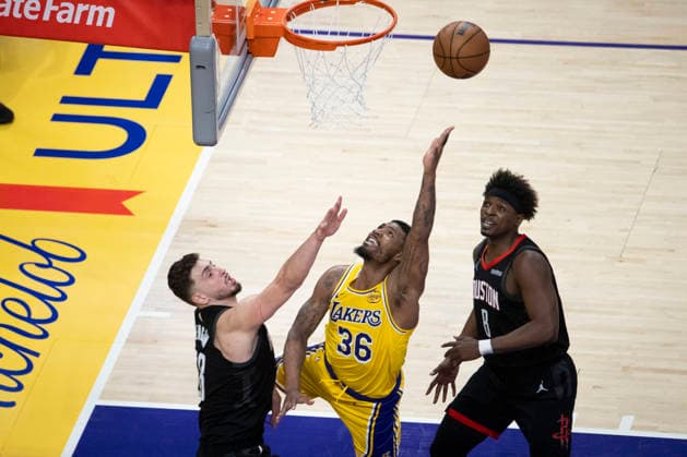 April 18, 2026, Los Angeles, California, USA: Los Angeles LakersÃ¢â‚¬â ¢ Marcus Smart (36) goes to the basket under pressure from Houston RocketsÃ¢â‚¬â ¢ Alperen Sengun (28) during Game 1 of a first-round NBA, Basketball Herren, USA playoff series at Crypto.com Arena on Saturday, April 18, 2026 in Los Angeles. Los Angeles USA - ZUMAc68_ 20260418_zaf_c68_064 Copyright: xRingoxChiux