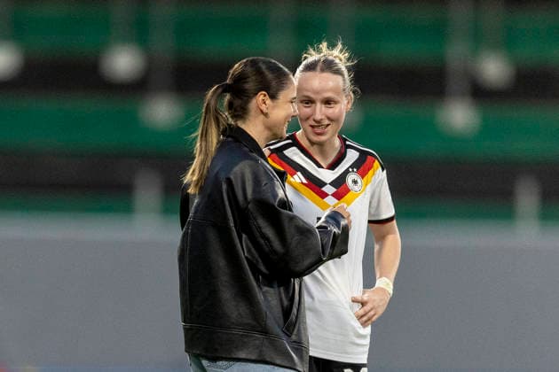 AUT, Ried im Innkreis, Soccer, Womens World Cup Qualification, Matchday 4, Austria vs Germany in picture from left Sarah Zadrazil Austria injured, in conversation with Franziska Kett Germany 17 , after final whistle 18 04 2026, BWT X Oberoesterreichische Arena Ried im Innkreis UEFA REGULATIONS PROHIBIT ANY USE OF PHOTOGRAPHS AS IMAGE SEQUENCES AND OR QUASI VIDEO, Copyright: HMBxMedia PaulxFritz