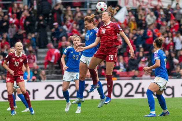 Denmark v Italy - FIFA Women s World Cup 2027 Qualifier Cristiana Girelli of Italy and Cecilie Floe of Denmark compete in a header duel during the 2027 FIFA Women s World Cup Qualifier between Denmark and Italy at Parken Stadium in Copenhagen, Denmark, on April 18, 2026. Copenhagen Denmark  Copyright: xKristianxTuxenxLadegaardxBergx originalFilename:berg-denmarkv260418_np2Vj.jpg