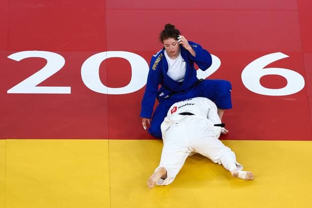 Belgian Vicky Verschaere (blue gi) competes against German Mathilda Niemeyer (white gi) in the first round of the women -78kg category, at the European Championships judo in Tbilisi, Georgia, on Sunday 19 April 2026. NIKOLAxKRISTC  x171309074x