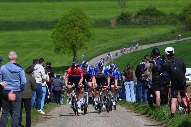 Amstel Gold Race 2026 Cycling Race VALKENBURG, THE NETHERLANDS - APRIL 19 : Van Poppel Danny (NED) of Red Bull - BORA - Hansgrohe, Evenepoel Remco (BEL) of Red Bull - BORA - Hansgrohe and the peloton during the 60th edition of Amstel Gold Race an UCI World Tour 1.UWT one day cycling road race for Men Elite of 220 km with start in Maastricht and finish in Valkenburg on April 19, 2026 in Valkenburg, The Netherlands, 19 04 2026 ( Motordriver Kenny Verfaillie - Valkenburg The Netherlands  Copyright: xVincentxKalutx