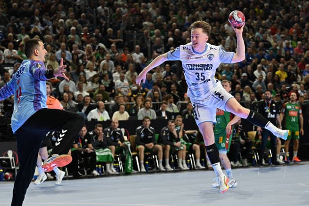 GER, Lanxess Arena Koeln, HBL, LIDL FINAL4, Men, Match for 3rd place, TBV Lemgo Lippe vs SC Magdeburg 19 04 2026, Lanxess Arena , Koeln , GER, Lanxess Arena Koeln, HBL, LIDL FINAL4, Men, Match for 3rd place, TBV Lemgo Lippe vs SC Magdeburg , in the picture Jarnes Faust TBV Lemgo 35 , free in front of the goal and in front of Matej MandiÄ‡ goalkeeper SC Magdeburg 12 , nordphotoxGmbHx xMeuter nph00351