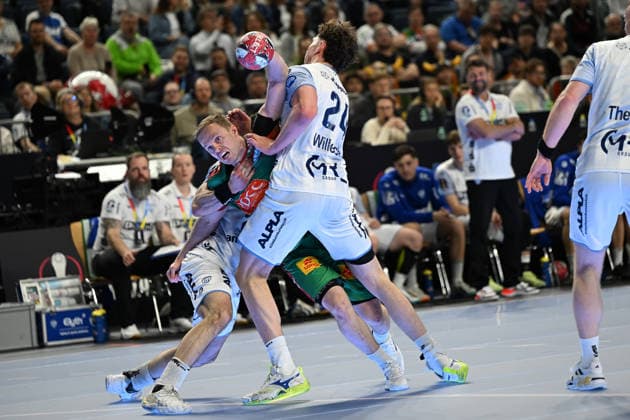 GER, Lanxess Arena Koeln, HBL, LIDL FINAL4, Men, Match for 3rd place, TBV Lemgo Lippe vs SC Magdeburg 19 04 2026, Lanxess Arena , Koeln , GER, Lanxess Arena Koeln, HBL, LIDL FINAL4, Men, Match for 3rd place, TBV Lemgo Lippe vs SC Magdeburg , in the picture Omar Ingi Magnusson SC Magdeburg 14 , in a duel against Joel Willecke TBV Lemgo 24 , nordphotoxGmbHx xMeuter nph00351