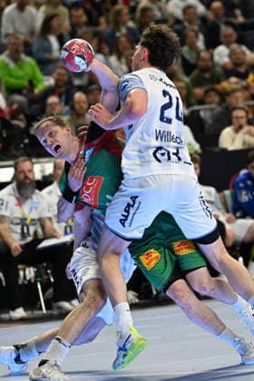 GER, Lanxess Arena Koeln, HBL, LIDL FINAL4, Men, Match for 3rd place, TBV Lemgo Lippe vs SC Magdeburg 19 04 2026, Lanxess Arena , Koeln , GER, Lanxess Arena Koeln, HBL, LIDL FINAL4, Men, Match for 3rd place, TBV Lemgo Lippe vs SC Magdeburg , in the picture Omar Ingi Magnusson SC Magdeburg 14 , in a duel against Joel Willecke TBV Lemgo 24 , nordphotoxGmbHx xMeuter nph00351