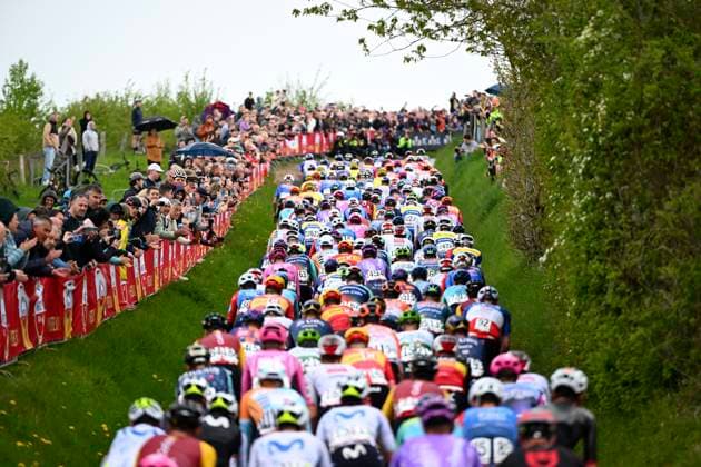 Amstel Gold Race 2026 Cycling Race VALKENBURG, THE NETHERLANDS - APRIL 19 : illustration picture peloton during the 60th edition of Amstel Gold Race an UCI World Tour 1.UWT one day cycling road race for Men Elite of 220 km with start in Maastricht and finish in Valkenburg on April 19, 2026 in Valkenburg, The Netherlands, 19 04 2026 ( Motordriver Kenny Verfaillie - Valkenburg The Netherlands  Copyright: xVincentxKalutx