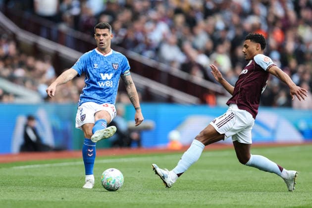 Birmingham, England, 19th April 2026. Granit Xhaka of Sunderland passes the ball during the Aston Villa vs Sunderland Premier League match at Villa Park, Birmingham. Picture credit should read: Gareth Evans Sportimage EDITORIAL USE ONLY. No use with unauthorised audio, video, data, fixture lists, club league logos or live services. Online in-match use limited to 120 images, no video emulation. No use in betting, games or single club league player publications. SPI_032_GE_Aston_Villa_vs_Sunderland SPI-4703-0032