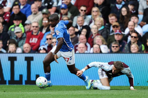 Birmingham, England, 19th April 2026. Noah Sadiki of Sunderland gets the better of Matty Cash of Aston Villa during the Aston Villa vs Sunderland Premier League match at Villa Park, Birmingham. Picture credit should read: Gareth Evans Sportimage EDITORIAL USE ONLY. No use with unauthorised audio, video, data, fixture lists, club league logos or live services. Online in-match use limited to 120 images, no video emulation. No use in betting, games or single club league player publications. SPI_042_GE_Aston_Villa_vs_Sunderland SPI-4703-0042