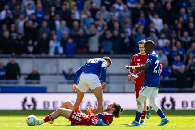 Football - FA Premier League - Everton FC v Liverpool FC LIVERPOOL, ENGLAND - Sunday, April 19, 2026: Liverpool s Dominik Szoboszlai lies on the pitch as Everton s Iliman Ndiaye (R) reacts during the FA Premier League match between Everton FC and Liverpool FC, the 248th Merseyside Derby, at Bramley-Moore Dock. (Photo by David Rawcliffe Propaganda) LIVERPOOL Bramley-Moore Dock MERSEYSIDE ENGLAND  Copyright: xDavidxRawcliffex P2026-04-19-Everton_Liverpool-99