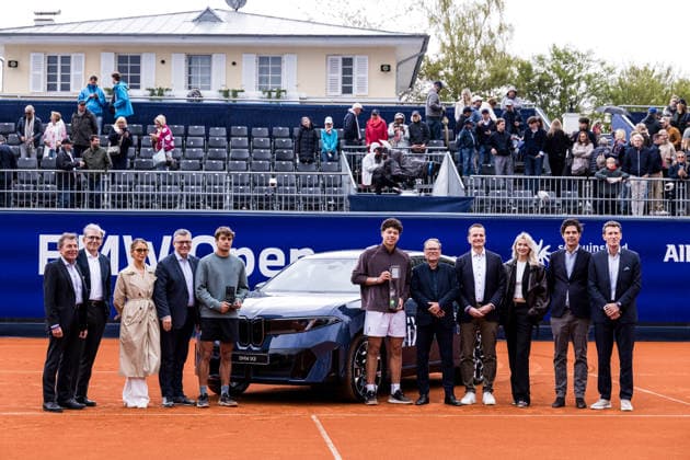 MUNICH, GERMANY - APRIL 19: Runner Up Flavio Cobolli (ITA) and BMW Open winner Ben Shelton (USA) pose with tournament officials and the award car during the trophy ceremony of the BMW Open by Bitpanda Singles match between Flavio Cobolli (ITA) vs Ben Shelton (USA) at MTTC Iphitos on April 19, 2026 in Munich, Germany. Bavaria Germany Copyright: xSteffiexWunderlx