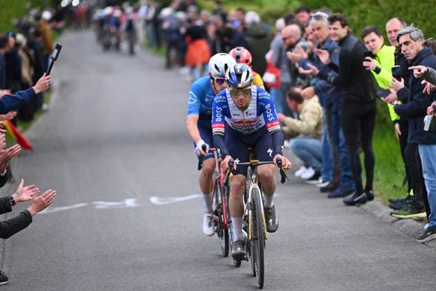 Amstel Gold Race 2026 Cycling Race VALKENBURG, THE NETHERLANDS - APRIL 19 : Evenepoel Remco (BEL) of Red Bull - BORA - Hansgrohe, Gregoire Romain (FRA) of Groupama - FDJ United, Skjelmose Mattias (DEN) of Lidl - Trek during the 60th edition of Amstel Gold Race an UCI World Tour 1.UWT one day cycling road race for Men Elite of 220 km with start in Maastricht and finish in Valkenburg on April 19, 2026 in Valkenburg, The Netherlands, 19 04 2026 ( Motordriver Kenny Verfaillie - Valkenburg The Netherlands  Copyright: xVincentxKalutx
