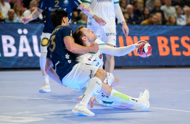 l r Eloy MORANTE MALDONADO BHC , Mathias GIDSEL B duel, action final Füchse Berlin B Bergischer HC BHC , on 19 04 2026 Handball DHB Pokal Final4 2026, from 18 04 19 04 2026 in Cologne Germany Â