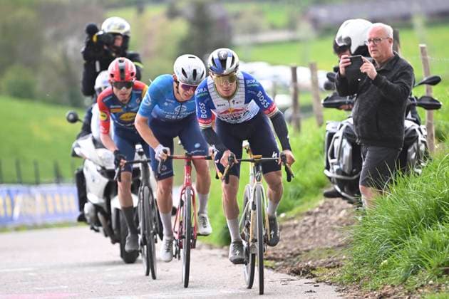 Amstel Gold Race 2026 Cycling Race VALKENBURG, THE NETHERLANDS - APRIL 19 : Evenepoel Remco (BEL) of Red Bull - BORA - Hansgrohe, Gregoire Romain (FRA) of Groupama - FDJ United, Skjelmose Mattias (DEN) of Lidl - Trek during the 60th edition of Amstel Gold Race an UCI World Tour 1.UWT one day cycling road race for Men Elite of 220 km with start in Maastricht and finish in Valkenburg on April 19, 2026 in Valkenburg, The Netherlands, 19 04 2026 ( Motordriver Kenny Verfaillie - Valkenburg The Netherlands  Copyright: xVincentxKalutx
