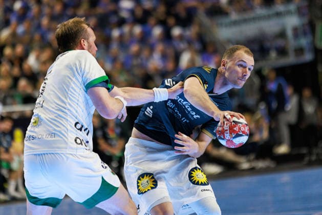 Fynn HANGSTEIN Bergischer HC 06, 10 in duel against Max DARJ Fuechse Berlin, 05 GER, Fuechse Berlin vs Bergischer HC, Handball, DHB Pokal, LIDL Final4, Final, Season 2025 2026, 19 04 2026, GER, Fuechse Berlin vs Bergischer HC, Handball, DHB Pokal, LIDL Final4, Final, Season 2025 2026, 19 04 2026, Koeln Copyright: xEibnerxPressefoto OliverxSchmidtx EP_OST