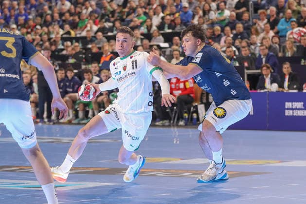 19 04 2026 ,xgox, Handball DHB Pokal Final Füchse Berlin Bergischer HC emspor, v l Lasse Andersson Berlin, 11 , Aron Seesing Bergischer HC, 49 duel, fight, tackle Koeln