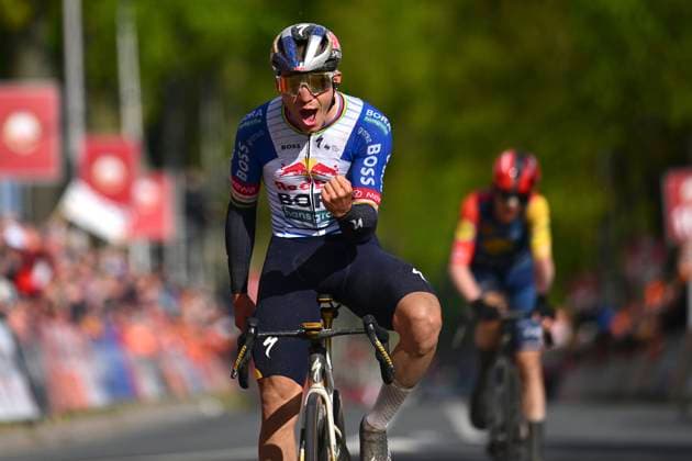 Amstel Gold Race 2026 Cycling Race VALKENBURG, THE NETHERLANDS - APRIL 19 : Evenepoel Remco (BEL) of Red Bull - BORA - Hansgrohe wins, second place for Skjelmose Mattias (DEN) of Lidl - Trek during the 60th edition of Amstel Gold Race an UCI World Tour 1.UWT one day cycling road race for Men Elite of 220 km with start in Maastricht and finish in Valkenburg on April 19, 2026 in Valkenburg, The Netherlands, 19 04 2026 ( Motordriver Kenny Verfaillie - Valkenburg The Netherlands  Copyright: xVincentxKalutx
