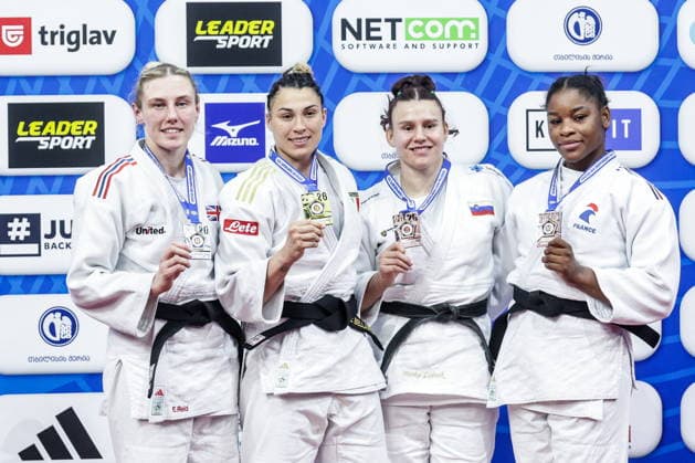 GEORGIA, TBILISI - APRIL 19, 2026: Silver medalist Emma Reid of Great Britain, gold medalist Alice Bellandi of Italy, bronze medalists Metka Lobnik of Slovenia and Kaila Issoufi of France (L-R) pose during a victory ceremony for the half-heavyweight (-78kg) during the 2026 European Judo Championships at the Olympic Palace. Mikhail Sinitsyn TASS  91450956