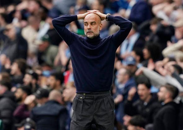 Manchester, England, 19th April 2026. Pep Guardiola coach of Manchester City reacts to a chance during the Manchester City vs Arsenal Premier League match at the Etihad Stadium, Manchester. Picture credit should read: Andrew Yates Sportimage EDITORIAL USE ONLY. No use with unauthorised audio, video, data, fixture lists, club league logos or live services. Online in-match use limited to 120 images, no video emulation. No use in betting, games or single club league player publications. SPI_035_AY_Man_City_Arsenal SPI-4704-0035