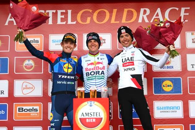 Amstel Gold Race 2026 Cycling Race VALKENBURG, THE NETHERLANDS - APRIL 19 : Skjelmose Mattias (DEN) of Lidl - Trek, Evenepoel Remco (BEL) of Red Bull - BORA - Hansgrohe and Cosnefroy Benoit (FRA) of UAE Team Emirates - XRG pictured during the podium ceremony of the 60th edition of Amstel Gold Race an UCI World Tour 1.UWT one day cycling road race for Men Elite of 220 km with start in Maastricht and finish in Valkenburg on April 19, 2026 in Valkenburg, The Netherlands, 19 04 2026 ( Motordriver Kenny Verfaillie - Valkenburg The Netherlands  Copyright: xVincentxKalutx