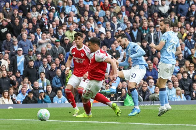 Premier League: Manchester City v Arsenal Rayan Cherki of Manchester City scores to make it 1-0 during the Premier League match Manchester City vs Arsenal at Etihad Stadium, Manchester, United Kingdom on 19 April 2026 (Photo by Mark Cosgrove News Images) Manchester Etihad Stadium Greater Manchester United, ManU Kingdom Copyright: xMarkxCosgrove NewsxImagesx