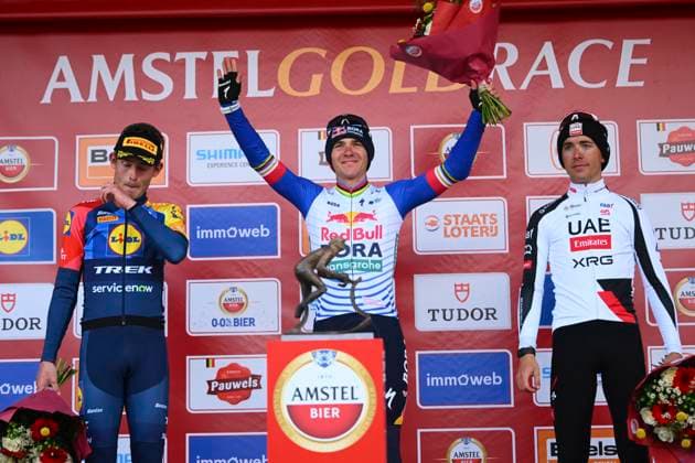 Amstel Gold Race 2026 Cycling Race VALKENBURG, THE NETHERLANDS - APRIL 19 : Skjelmose Mattias (DEN) of Lidl - Trek, Evenepoel Remco (BEL) of Red Bull - BORA - Hansgrohe and Cosnefroy Benoit (FRA) of UAE Team Emirates - XRG pictured during the podium ceremony of the 60th edition of Amstel Gold Race an UCI World Tour 1.UWT one day cycling road race for Men Elite of 220 km with start in Maastricht and finish in Valkenburg on April 19, 2026 in Valkenburg, The Netherlands, 19 04 2026 ( Motordriver Kenny Verfaillie - Valkenburg The Netherlands  Copyright: xVincentxKalutx