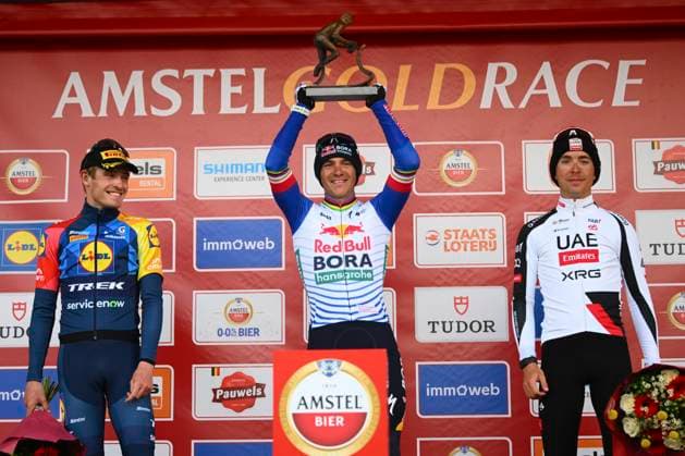 Amstel Gold Race 2026 Cycling Race VALKENBURG, THE NETHERLANDS - APRIL 19 : Skjelmose Mattias (DEN) of Lidl - Trek, Evenepoel Remco (BEL) of Red Bull - BORA - Hansgrohe and Cosnefroy Benoit (FRA) of UAE Team Emirates - XRG pictured during the podium ceremony of the 60th edition of Amstel Gold Race an UCI World Tour 1.UWT one day cycling road race for Men Elite of 220 km with start in Maastricht and finish in Valkenburg on April 19, 2026 in Valkenburg, The Netherlands, 19 04 2026 ( Motordriver Kenny Verfaillie - Valkenburg The Netherlands  Copyright: xVincentxKalutx