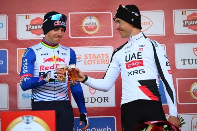 Amstel Gold Race 2026 Cycling Race VALKENBURG, THE NETHERLANDS - APRIL 19 : Evenepoel Remco (BEL) of Red Bull - BORA - Hansgrohe and Cosnefroy Benoit (FRA) of UAE Team Emirates - XRG pictured during the podium ceremony of the 60th edition of Amstel Gold Race an UCI World Tour 1.UWT one day cycling road race for Men Elite of 220 km with start in Maastricht and finish in Valkenburg on April 19, 2026 in Valkenburg, The Netherlands, 19 04 2026 ( Motordriver Kenny Verfaillie - Valkenburg The Netherlands  Copyright: xVincentxKalutx