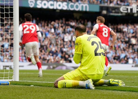 Manchester, England, 19th April 2026. Kai Havertz of Arsenal turns away to celebrate after intercepting a kick by Gianluigi Donnarumma of Manchester City to equalise during the Manchester City vs Arsenal Premier League match at the Etihad Stadium, Manchester. Picture credit should read: Andrew Yates Sportimage EDITORIAL USE ONLY. No use with unauthorised audio, video, data, fixture lists, club league logos or live services. Online in-match use limited to 120 images, no video emulation. No use in betting, games or single club league player publications. SPI_047_AY_Man_City_Arsenal SPI-4704-0046