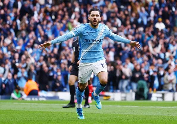 Rayan Cherki of Manchester City celebrates scoring the opening goal Manchester City v Arsenal, Premier League, Football, Etihad Stadium, Manchester, UK - 19 Apr 2026Manchester Etihad Stadium United Kingdom EDITORIAL USE ONLY No use with unauthorised audio, video, data, fixture lists, club league logos or live services. Online in-match use limited to 120 images, no video emulation. No use in betting, games or single club league player publications. Copyright: xMattxWest Shutterstockx 16836204u