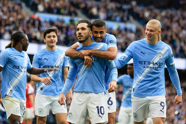 Manchester City v Arsenal, Premier League Rayan Cherki (10) of Manchester City celebrates scoring to make it 1-0 with Rodrigo (16) of Manchester City during the Premier League match between Manchester City and Arsenal at the Etihad Stadium, Manchester, UK on 19 April 2026. Manchester Etihad Stadium Manchester UK Editorial use only DataCo restrictions apply See www.football-dataco.com , Copyright: xConorxMolloyx PSI-24102-0040