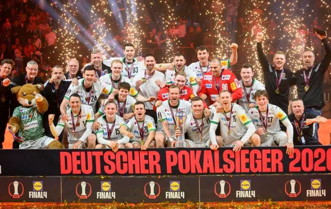 Award ceremony, cheering team Füchse Berlin with the SHB POkal Final Füchse Berlin B Bergischer HC BHC , on 19 04 2026 Handball DHB Pokal Final4 2026, from 18 04 19 04 2026 in Cologne Germany Â