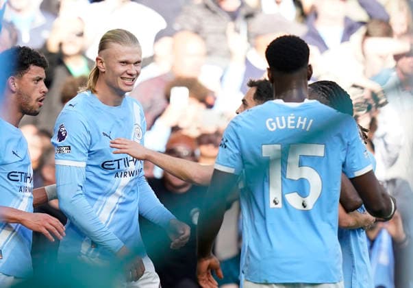 Manchester, England, 19th April 2026. Erling Haaland of Manchester City celebrates scoring their second goal during the Manchester City vs Arsenal Premier League match at the Etihad Stadium, Manchester. Picture credit should read: Andrew Yates Sportimage EDITORIAL USE ONLY. No use with unauthorised audio, video, data, fixture lists, club league logos or live services. Online in-match use limited to 120 images, no video emulation. No use in betting, games or single club league player publications. SPI_091_AY_Man_City_Arsenal SPI-4704-0090