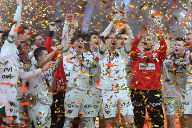 GER, Lanxess Arena Koeln, HBL, LIDL FINAL4, Men, Final, Fuechse Berlin vs bergischer HC 19 04 2026, Lanxess Arena , Koeln , GER, Lanxess Arena Koeln, HBL, LIDL FINAL4, Men, Final, Fuechse Berlin vs bergischer HC, in the picture the Fuechse Berlin are German Cup Winners 2026 and stand on the podium and celebrate the title with the cup nordphotoxGmbHx xMeuter nph00351